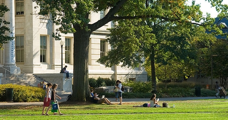 Students walk on the American University quad.